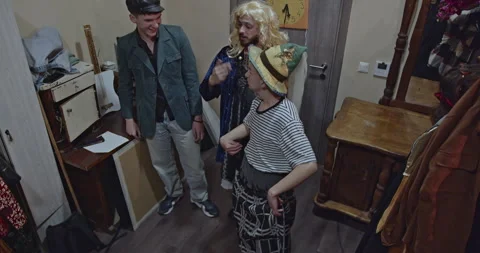Actors Backstage: Preparing Costumes, Wigs, and Discussing Roles Before Theater Stock Footage 312067608