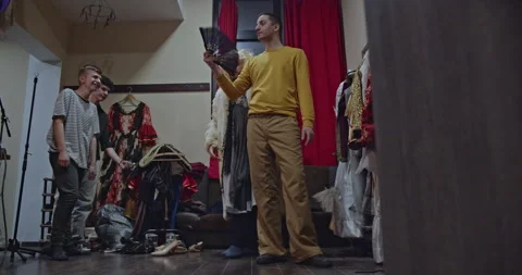 Actors Backstage Preparing for a Theater Play: Rehearsing Lines, Trying Costumes Stock Footage 312054335