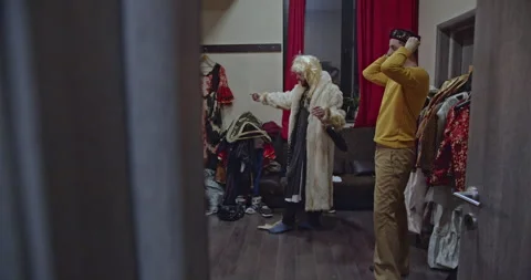 Actors Backstage: Preparing for a Theatrical Performance with Costumes, Laughter Stock Footage 312073346