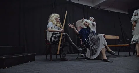 Actors Backstage: Preparing for a Theatrical Performance. Rehearsing Lines Stock Footage 312078831