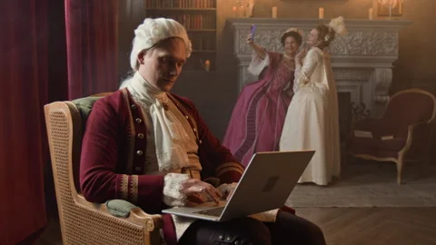Actors in Costumes Using Digital Gadgets while Filming Historical Movie Stock Footage 316687555