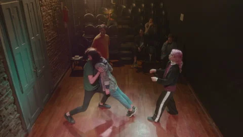 Actors Doing Trust Falls during Class with Stage Director in a Theater Stock Footage 247790154