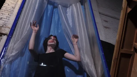 Actress dances closed in transparent box with curtains Stock Footage 115255046