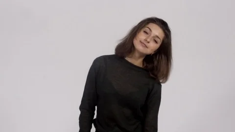 The actress grimaces and dances in the studio Stock Footage 81773626