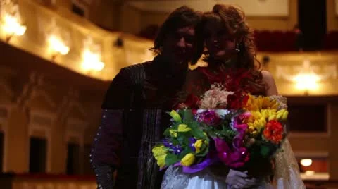 Actress A.Makeeva and actor Ilya Viktorov smile after musical Stock Footage 22010919