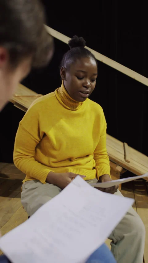 Actress Memorizing Script on Rehearsal with Scene Partner in Theatre Stock Footage 278975150