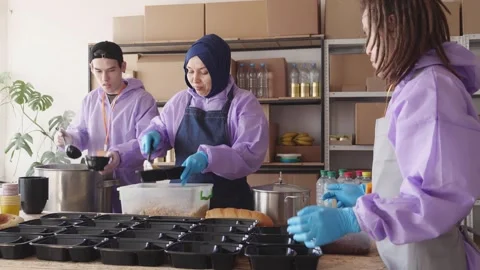 Acts of Kindness During Ramadan: Hot Meals for the Hungry Stock Footage 301512357