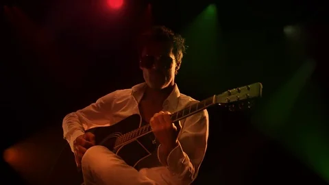 ACUSTIC GUITAR PLAYER ON STAGE Video stock 74764397
