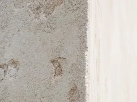 Acute angle corner with old beige facade Stock Photos