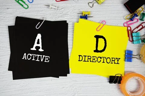 AD - Active Directory text on stick note with stationery on concrete backgrou Stock Photos