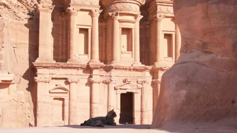 Ad Deir Monastery Petra Jordan, ancient Nabataean rock carved facade with r.. Видео 341264932