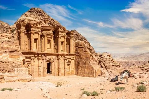 Ad Deir or The Monastery, ancient Nabataean stone carved temple, with donke.. Stock Photos