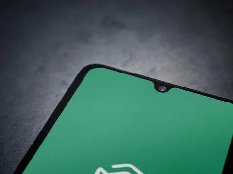 Adam Ai app launch screen on smartphone on dark marble stone background Stock Photos