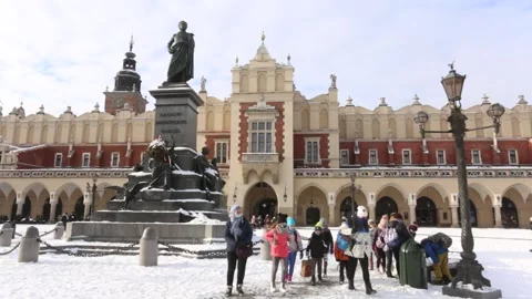 Adam Mickiewicz`s statue in front of the ancient Cloth Hall. 4605 Stock Footage 147455287