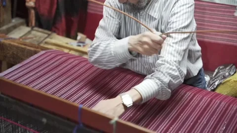 Adam's handiwork, the scarf loom in a stripe. Fez, Morocco, North Africa, 2022 Stock-Footage 236304830