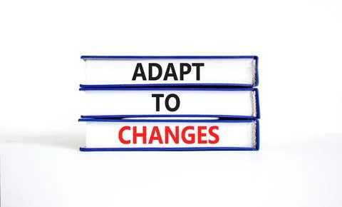 Adapt to changes and support symbol. Concept words Adapt to changes on books. Stock Photos