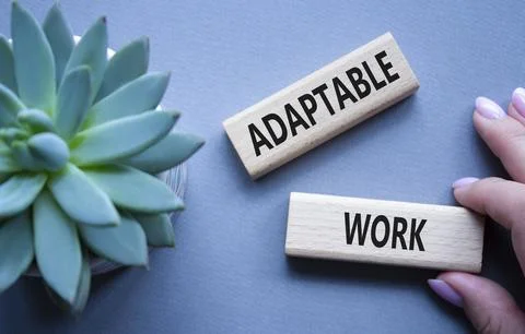 Adaptable work symbol. Concept word Adaptable work on wooden blocks. Beauti.. Stock Photos