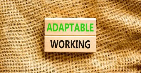 Adaptable working symbol. Concept words Adaptable working on beautiful wood.. Stock Photos