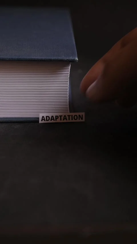 Adaptation Text Near Book Representing Change Learning and Resilience Stock Footage 337748789