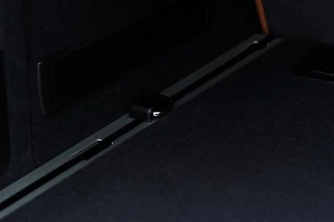 Adaptive fastening system in car trunk. Modern car trunk. Close up view of a  Stock Photos