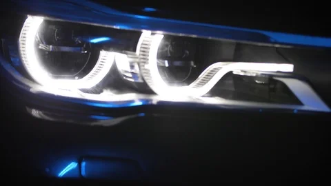Adaptive LED optics for BMW 7 Series, close shot, color light and smoke Stock Footage 125868069