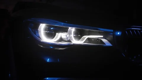 Adaptive LED optics for BMW 7 Series, close shot, color light and smoke Video stock 125868241