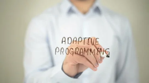 Adaptive Programming, man writing on transparent screen Stock Footage 62776029