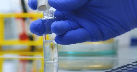 Add bacteria pipette Stock Footage 111854140