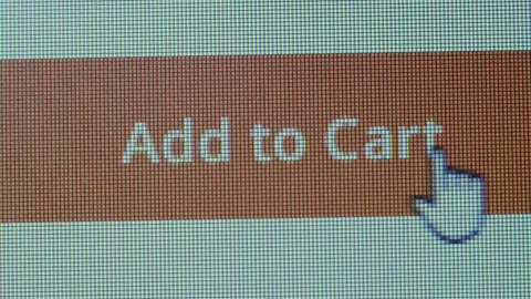 The add to cart button on the computer screen cursor clicks on the add to cart Stock Footage 153523141