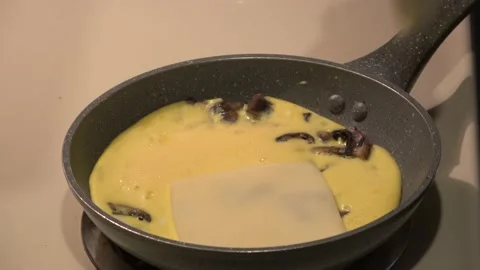 Add Cheese to an omelette. Stock Footage 207521954