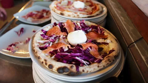 Add of extra virgin olive oil Over The Pizza Stock Footage 286721359