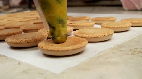 Add filling to Macarons Stock Footage 62426249