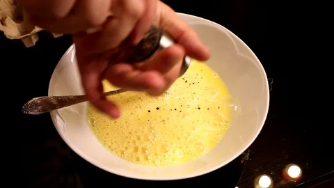 Add of Freshly Ground Pepper to Eggs Video stock 90952269