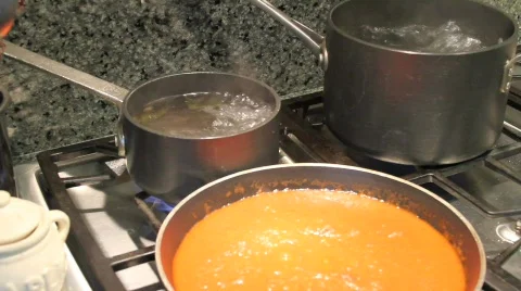 Add Meatballs to sauce Stock Footage 541666