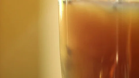 Add milk to the tea Stock Footage 75651179