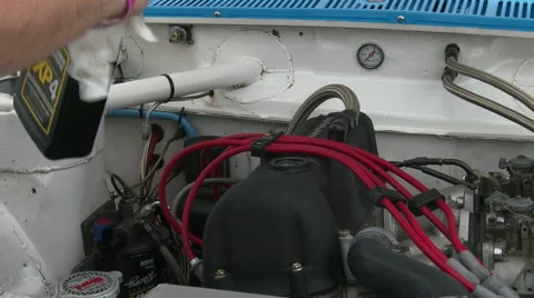 Add oil to engine 2 Stock Footage 49613608