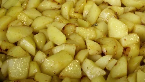 Add spices to fried potatoes Video stock 90997433
