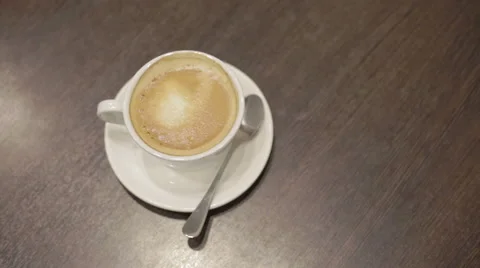 Add the sugar in cappuccino Stock Footage 48997664