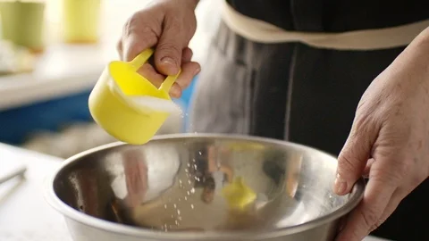 Add sugar to dough Stock Footage 105350859
