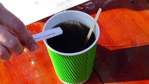 Add sugar to a glass of tea Stock Footage 100181006