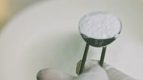 Add a tablespoon of baking powder to the flour Video stock 169154580