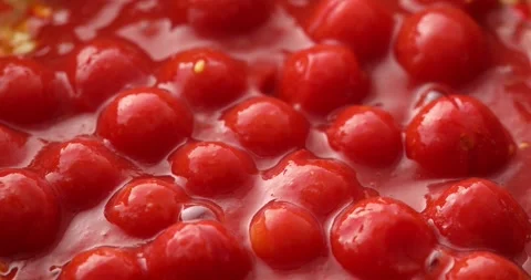 Add the tomatoes to the fried onions and Paprika or sweet pepper in the pan Stock Footage 249663236