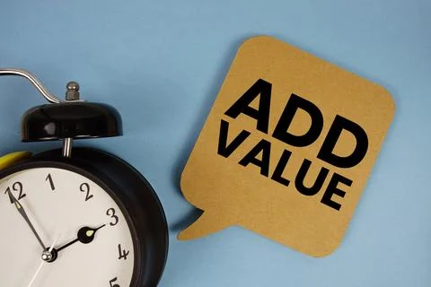 Add Value text with alarm clock on blue background Foto stock