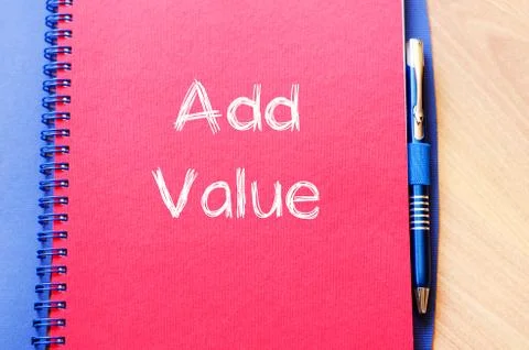 Add value write on notebook Stock Photos