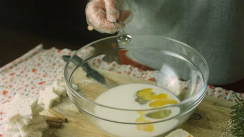 Add the vanilla essence to the milk mixture. French toast christmas tree holiday Stock Footage 166091644