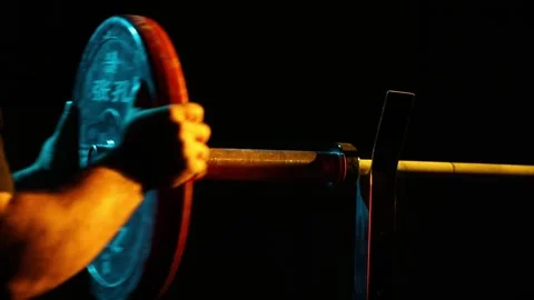 Add weight to the barbell 16 Stock Footage 310629367
