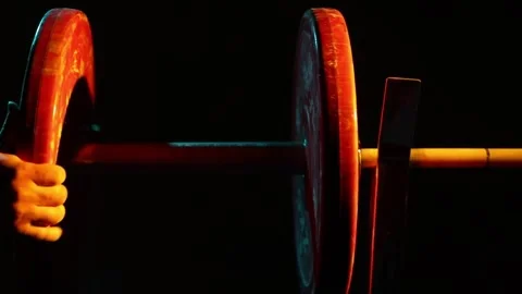 Add weight to the barbell 7 Stock Footage 309552199
