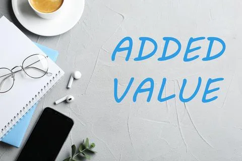 Added value concept. Flat lay composition with stationery on light background Stock Photos