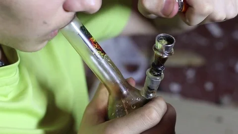 Addict Smokes Marijuana Stock Footage 71763657