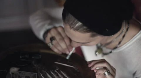 Addict taking cocaine Stock Footage 66786227